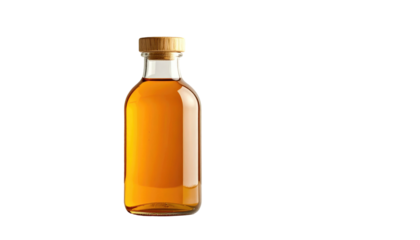Amber liquid fills glass bottle with a wooden lid on a black background, creating a simple product shot