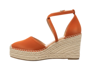 Isolated bright orange women's espadrille sandal with criss-cross ankle strap for summer fashion