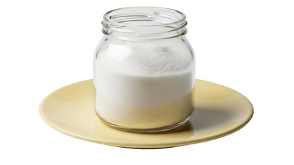 Isolated container of sugar on a plate, culinary ingredient or seasoning in clear jar