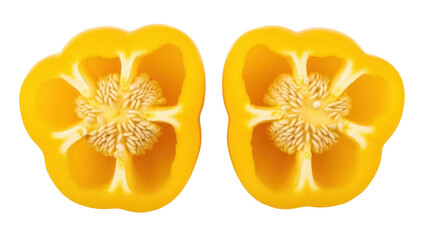Isolated yellow bell peppers cut open, showing seeds and ribs on white