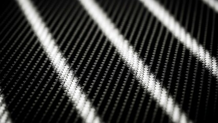 Close-up Macro of Carbon Fiber Texture with Diagonal White Light Streaks