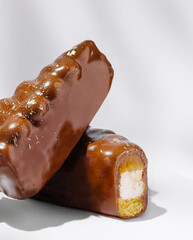 Delicious chocolate-coated dessert bars with a creamy filling and crunchy base