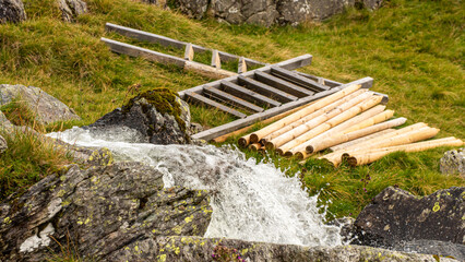 Water and Wood stored ready for construction and repair of mountain structures
