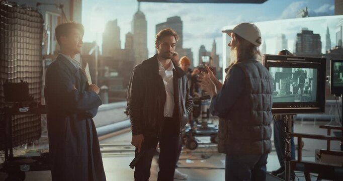 Female Director Briefs Two Male Actors on Rooftop Film Set, Revealing Collaborative Behind the Scenes Directing, Discussing Drama, Acting and Performance, Shot Planning During Movie Production