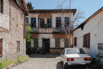 A classic car on a historic street.