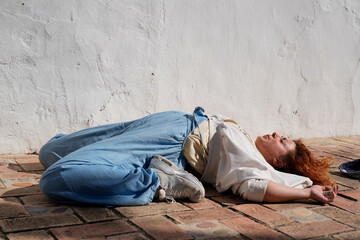 Young woman performing urban acrobatics street dance