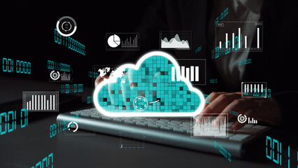 A business professional engages with cloud computing visuals and data analytics while working on a keyboard in a sophisticated digital workspace. Xenic