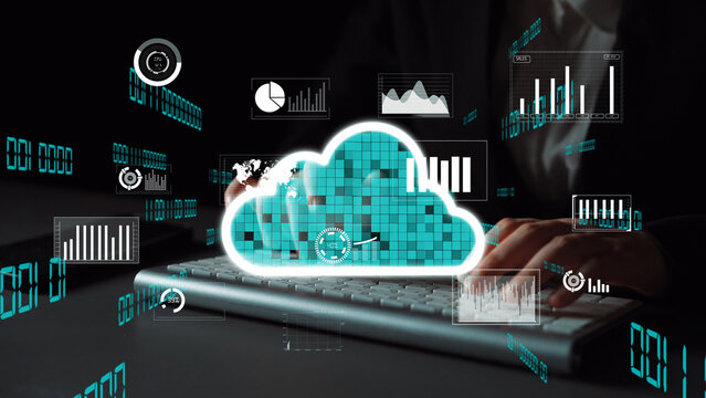 A business professional engages with cloud computing visuals and data analytics while working on a keyboard in a sophisticated digital workspace. Xenic - Powered by Adobe