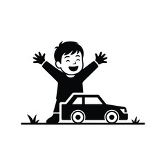 A joyful boy with arms raised stands beside a small toy car