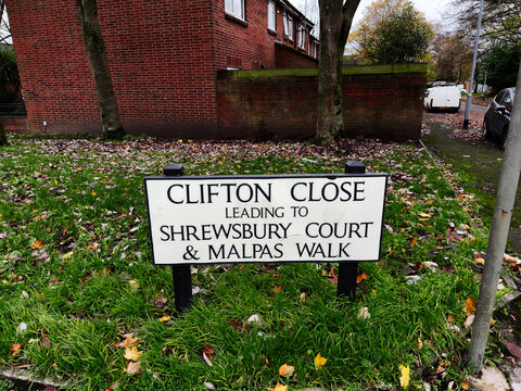 Clifton Close sign directing to Shrewsbury Court and Malpas Walk in Manchester UK
