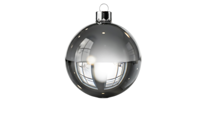 Clear glass Christmas ornament reflecting window and tree