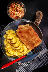 Fried cod fillet served.