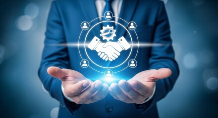 Man in blue suit holding glowing handshake and gear icon