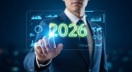 Man in suit touching glowing 2026 on futuristic screen