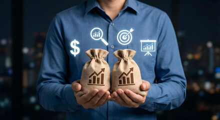 Businessman Holding Two Money Bags with Financial Growth Charts and Icons On Night City Background