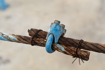 Old steel wire rope clamp for tightening sling