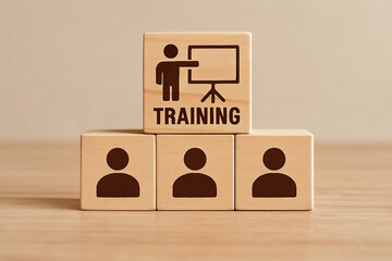 Wooden Blocks with Training Icon Representing Employee Learning and Development Concept