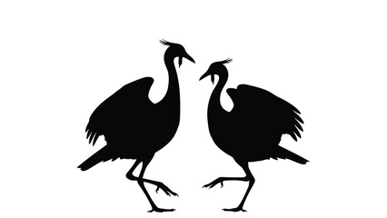 Fototapeta premium Two cranes facing each other in black silhouette isolated on white background