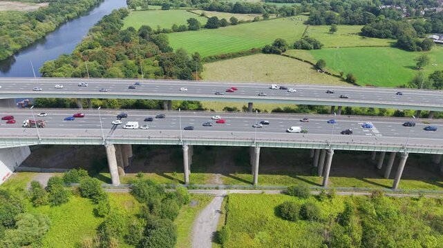 M6 Motorway, Lymm, Cheshire, UK, August 15, 2025; aerial view of the M6 Motorway Thelwall Viaduct bridge over the Manchester Ship Canal and River Mersey, Lymm, Cheshire, UK.