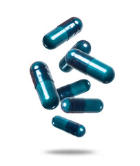 Medical capsules flying in the air closeup isolated on transparent background