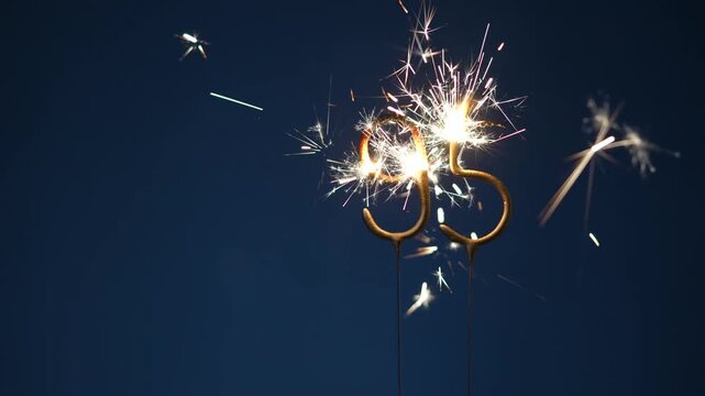 95 anniversary celebration festive background made with Bengal fires in the form of number Ninety four.