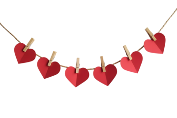 Red hearts hanging on a line with clips isolated transparent png.