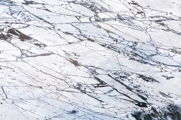 Close-up of marble surface with natural veining patterns
