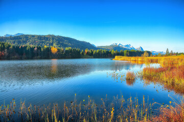 Fototapeta premium Fabulous view of Wagenbruchsee (Geroldsee) lake with Wetterstein mountain range on background.