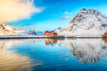 Astonishing morning view of small fishing village Ramberg at sunrise.
