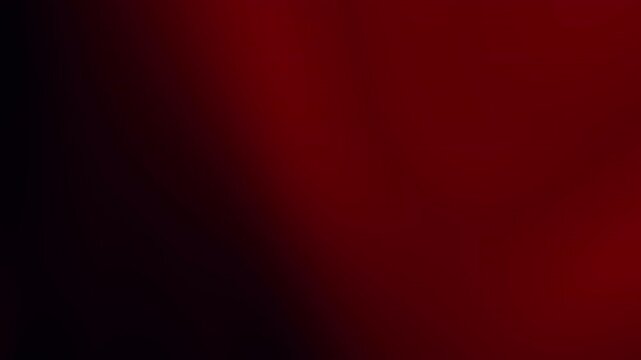 Smooth digital gradient blending deep black to rich dark red, creating a sophisticated and moody backdrop for modern graphic design and web elements