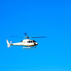 White helicopter flying in the blue sky