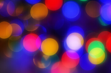 Abstract bokeh lights with vibrant colors creating a festive and magical atmosphere