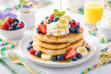 Delicious stack of pancakes with fresh berries and syrup drizzle for a festive breakfast setting. Mardi Gras Breakfast Shrove Tuesday