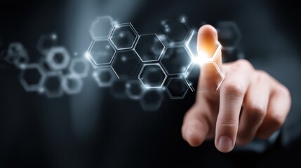 Hand Interacting with Futuristic Hexagonal Interface Displaying Data Visualization and Digital Concepts in Technology and Innovation
