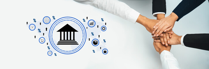 A dynamic representation of teamwork, featuring diverse hands joining together with financial icons and a bank symbol, emphasizing collaboration and unity in business environments. Trope