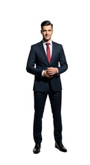 Confident young man in a dark suit holding papers, standing in a professional pose for a photo.