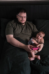 Father and Baby Bonding Over Video Games.