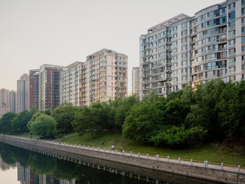 Apartment blocks alongside a canal in Beijing, China.
