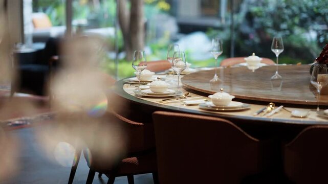 Elegant dining setup by garden view