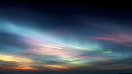 Vibrant and ethereal nacreous clouds painting the sky with iridescent hues at twilight.