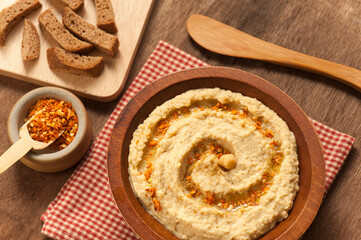 Creamy Hummus Bowl with Olive Oil and Spices