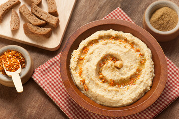 Creamy Hummus Bowl with Olive Oil and Spices