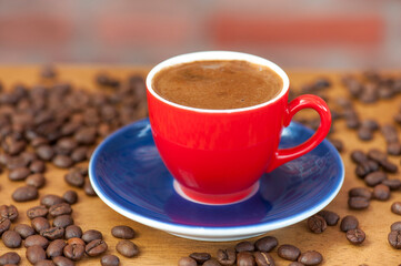 Red Cup of Turkish Coffee with Roasted Beans