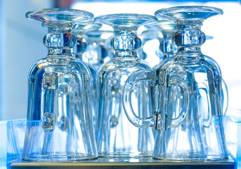 Inverted Glass Cups on Shelf