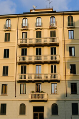 Old residential buildings along Viale Cassiodoro in Milan, Italy