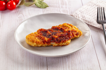 Roasted breaded crispy pork schnitzel