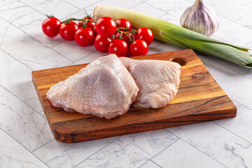 Raw chicken thighs for cooking