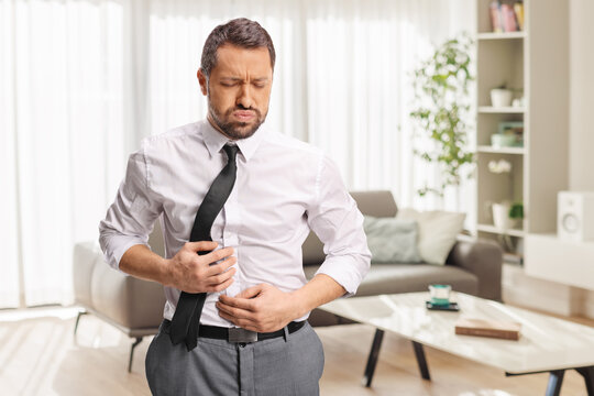Manwith stomach ache feeling bloated