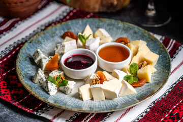 Artisan Cheese Platter With Honey And Jam