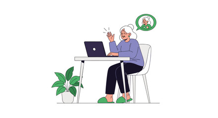 Fototapeta premium Happy elderly woman sitting at her desk, waving at the laptop screen during a video call with another senior person.